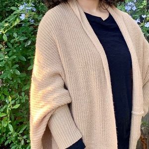 Long light brown knitted cardigan